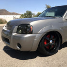 2001-2004 Nissan Frontier XE Factory Style Headlight (Chrome Housing / Smoked Lens)
