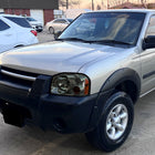 2001-2004 Nissan Frontier XE Factory Style Headlight (Chrome Housing / Smoked Lens)