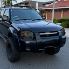 2001-2004 Nissan Frontier XE Factory Style Headlight (Chrome Housing / Smoked Lens)