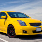 2007-2009 Nissan Sentra Factory Style Headlights with Amber Reflector (Matte Black Housing / Clear Lens)