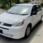 2004-2005 Toyota Sienna Driver / Left Side Factory Style Headlight w/ Amber Reflector (Chrome Housing / Clear Lens)