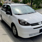 2004-2005 Toyota Sienna Factory Style Headlights w/ Amber Reflector (Matte Black Housing / Clear Lens)