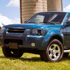 2001-2004 Nissan Frontier Dual Halo Projector Headlights (Glossy Black Housing/Smoke Lens)