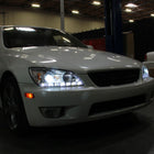 2001-2005 Lexus IS300 Projector Headlights w/ LED Light Strip & LED Turn Signal Lights (Chrome Housing/Clear Lens)