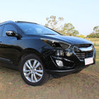 2010-2013 Hyundai Tucson Projector Headlights w/ LED Light Strip (Matte Black Housing/Clear Lens)