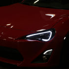 2013-2016 Scion FRS Projector Headlights w/ LED Strip & Turn Signal Lights (Jet Black Housing/Clear Lens)