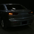 2008-2017 Mitsubishi Lancer / 2008-2015 Lancer EVO X Sedan Red Bar LED Tail Lights (Black Housing/Clear Lens)