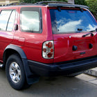 1996-2004 Nisssan Pathfinder/ Infiniti QX4 Tail Lights (Chrome Housing/Clear Lens)