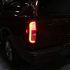 2014-2021 Toyota Tundra White Bar Sequential LED Tail Lights (Chrome Housing/Red Clear Lens)